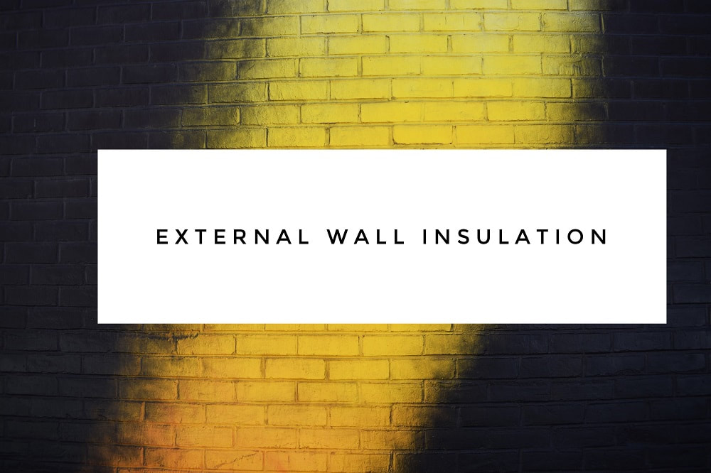 Wall with moody lighting on it and caption that reads external wall insulation_plastering and rendering services_gk rend